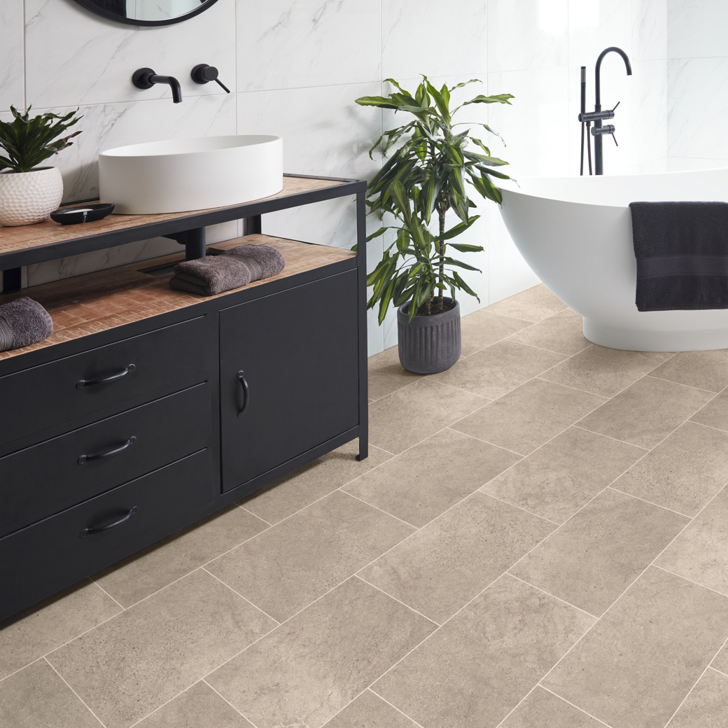 Karndean portland stone flooring with design strips in a bathroom Knight Tile ST13