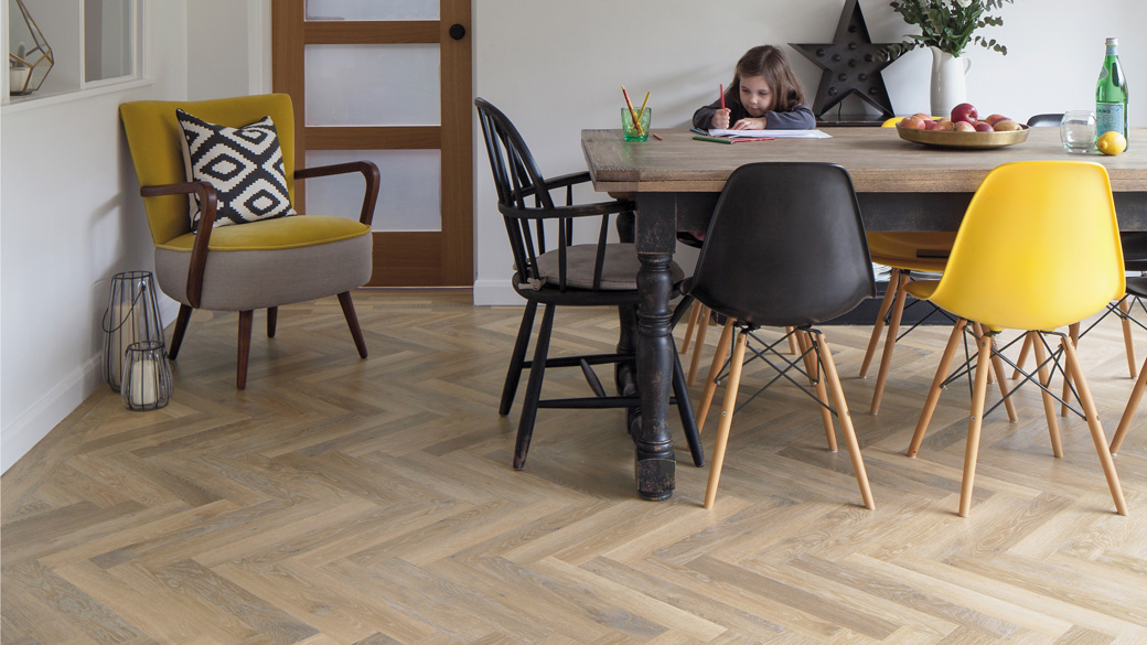 Karndean limed washed oak herringbone wood flooring in a dining room